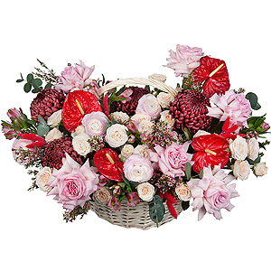 Red cut anthurium - 4, Chrysanthemum Bigoudi purple - 4, Peony style roses - 7, Ranunculus Pink - 5, Alstromeria white, soft pink - 11, Peony sprayrose - 5, Medium Basket, Oasis, Waxflower (1 pc.), Eucalyptus, Dried flowers in assortment