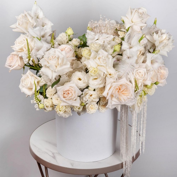 Peony style roses - 5, White rose 50 cm Ecuador - 12, lisianthus - 4, Spray rose: white, cream, light pink 50 cm - 17, White spray carnation - 18, White Gladiolus - 5,  White Hydrangea - 1, Round flower box medium, Oasis, Veronica spray, Eucalyptus, Amaranth stabilized, Feathers decor., Decorative crown