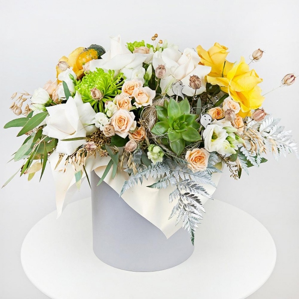 Yellow rose 50 cm - 8, Spray rose: white, cream, light pink 50 cm - 7, lisianthus - 5, Yellow chrysanthemum  single-headed Anastasia - 4, Round flower box medium, Oasis, Fern (1 pc.), Eucalyptus populus (1 pc.), Wrapping Paper, Echeveria small, Dried flowers decor, Decorative element small