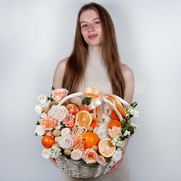 Cream Rose 50 cm Ecuador (Creme Caramel) - 3, Peony style roses - 3, Orange carnation - 8, White Matthiola - 5, Baltica White Spray Chrysanthemum - 2, Peony sprayrose - 3, Carnation white, cream - 9, Large Basket, Oasis, Pistachio, Orange, Tangerine, 1 pc., Walnut (10 pieces), Wooden skewer, Ribbon, Walnut (10 pieces)