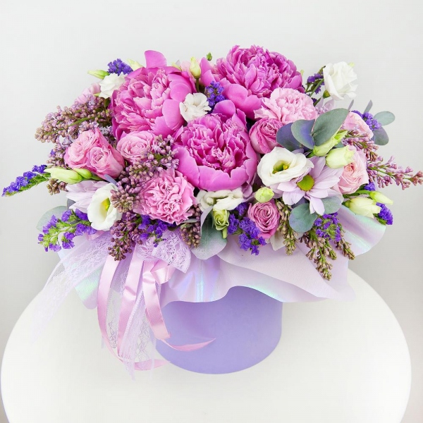 Peony pink - 5, Pink carnation - 5, Peony sprayrose - 4, lisianthus - 3, Lilac Bush - 3, Bacardi Pink Spray Chrysanthemum - 2, Round flower box small , Oasis, Wrapping Paper, Eucalyptus Cinerea, Blue Statice