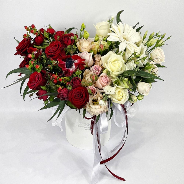 Red anemone - 4, Red rose 50 cm - 9, White rose 50 cm - 5, Pink rose 50 cm - 5, Spray rose: white, cream, light pink 50 cm - 4, White Matthiola - 1, lisianthus - 5, Gerbera white - 1, Spray rose: red 50 cm - 4, Round flower box small , Oasis, Eucalyptus, Hypericum, Wrapping Paper