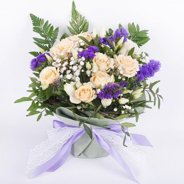 Spray rose: white, cream, light pink 50 cm - 3, Gypsophila - 1, lisianthus - 2, Blue Statice, Oasis, Pistachio, Fern (1 pc.), Wrapping Paper