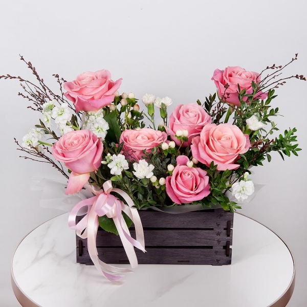 Pink rose 50 cm - 9, White Matthiola - 1, White spray carnation - 3, Wooden pot, Oasis, Wrapping Paper, Pistachio, Hypericum, Artificial branch