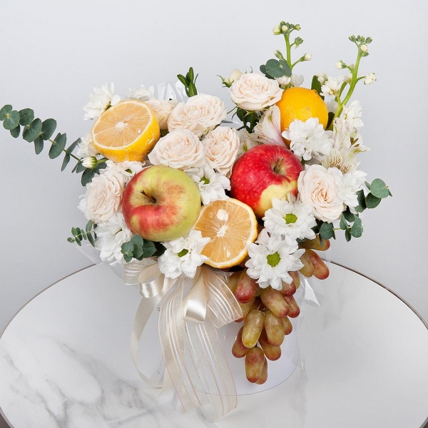 Bacardi White Spray Chrysanthemum - 2, Peony sprayrose - 2, White Matthiola - 1, Alstromeria white, soft pink - 3, Round flower box small , Oasis, Eucalyptus Cinerea, Lemon, 1 pc., Apple, 1 pc., Grapes, Wooden skewer, Ribbon
