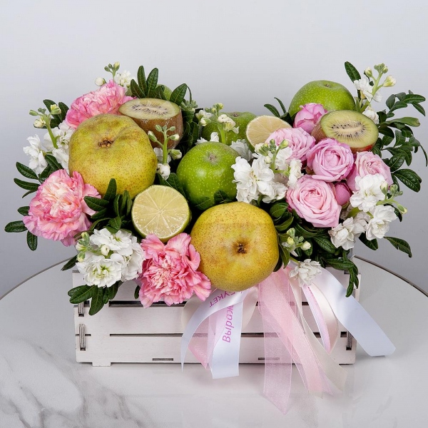 White Matthiola - 3, Peony sprayrose - 1, Pink carnation - 5, Wooden pot, Oasis, Lemon, 1 pc., Kiwi, Apple, 1 pc., Pear, Wooden skewer, Pistachio, Ribbon