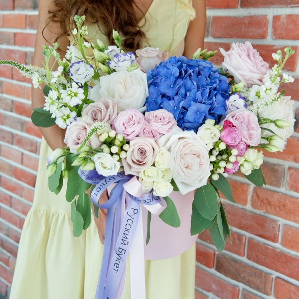 Blue/purple hydrangea - 1, Rose Powder 50 cm Ecuador (Quicksand, Menta) - 9, Peony style roses - 6, White Matthiola - 5, Spray rose: white, cream, light pink 50 cm - 8, Purple Lisianthus (Eustoma) - 6, Round flower box medium, Oasis, Wrapping Paper, Eucalyptus populus (1 pc.), Hypericum, Veronica spray