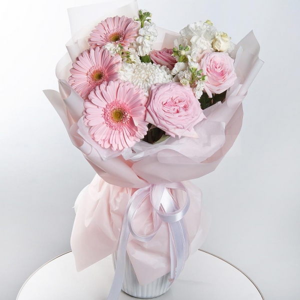 Chrysanthemum white Bigoudi - 1, Gerbera pink - 5, Peony rose pink 'OHara' - 3, White Matthiola - 2, lisianthus - 2, Wrapping Paper
