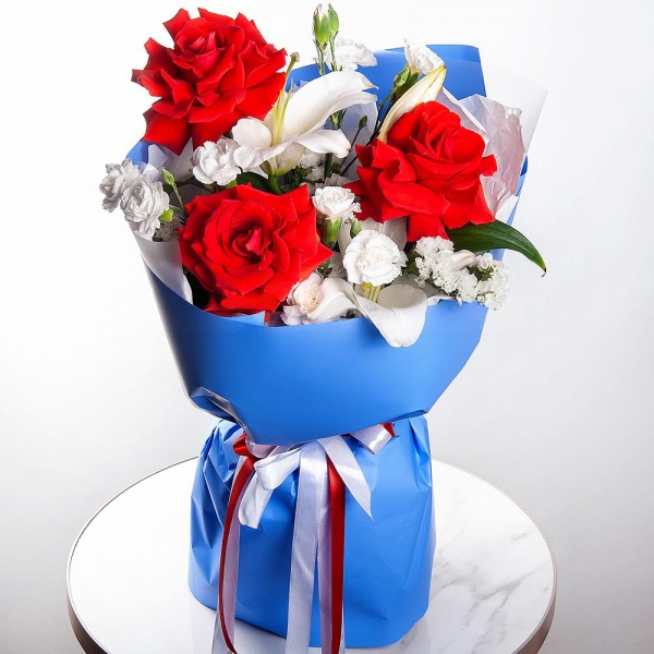 Lilies - 1, Red rose Nina 50 cm - 7, White spray carnation - 5, White statice, Wrapping Paper