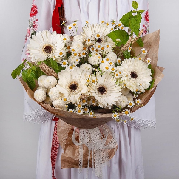 Gerbera white - 9, Chamomile - 3, Newton White Spray Chrysanthemum - 4, Dried flowers in assortment,  Raspberry branch, Wrapping Paper