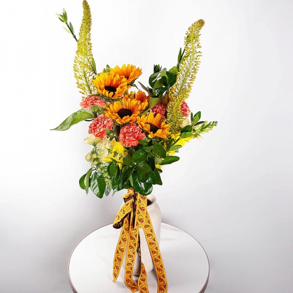 Sunflower - 5, Pink carnation - 9, White Matthiola - 3, White Delphinium - 3, Pittosporum, Ribbon