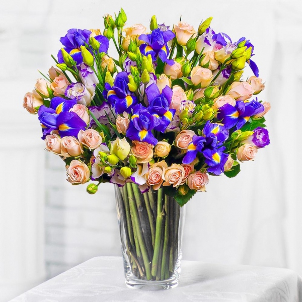 Spray rose: white, cream, light pink 50 cm - 11, Irises - 12, Purple Lisianthus (Eustoma) - 7, Mesh (Abaka), Ribbon