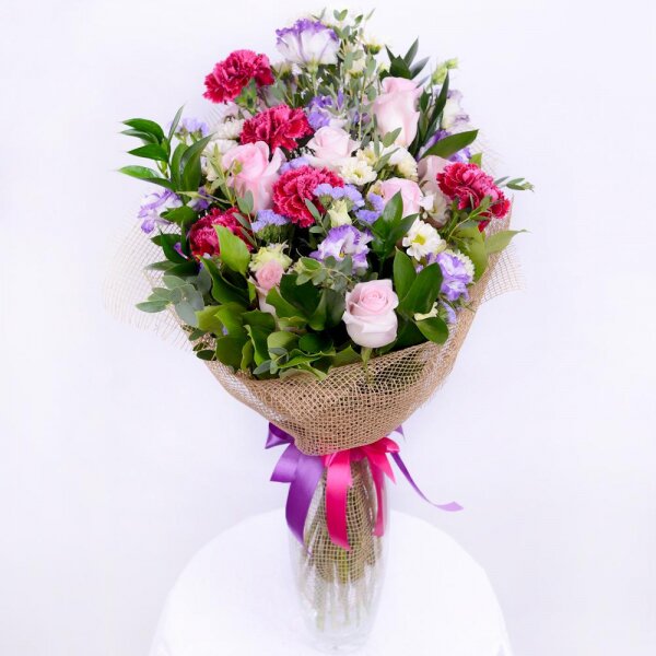 Pink rose 50 cm - 9, Pink carnation - 5, Santini White Spray Chrysanthemum - 4, Purple Lisianthus (Eustoma) - 4, Blue Statice, Ruscus, Eucalyptus parvifolia (1 pc.), Salal, Jute 1 meter, Ribbon