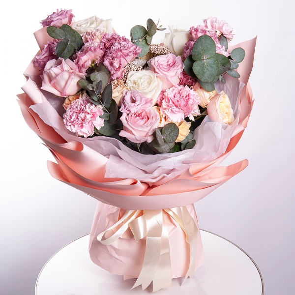 White rose 50 cm Ecuador - 3, Peony rose pink 'OHara' - 3, Pink Lisianthus (Eustoma) - 3, Baltica White Spray Chrysanthemum - 1, Spray rose: white, cream, light pink 50 cm - 3, Pink carnation - 3, Eucalyptus, Ozotamnus, Wrapping Paper