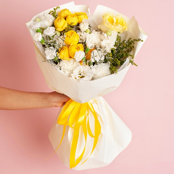 Spray rose: yellow, orange 50 cm - 2, lisianthus - 3, Carnation white, cream - 3, White spray carnation - 3, Rose Yellow 50 cm Ecuador (Mohana, Latina, Brighton) - 1, Solidago (1 pc.), Limonium (1 pc.), Wrapping Paper