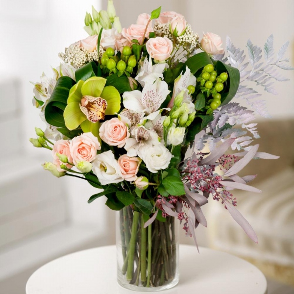 Spray rose: white, cream, light pink 50 cm - 4, lisianthus - 3, Green Cymbidium Orchid Bud - 2, Alstromeria white, soft pink - 3, Hypericum, Ozotamnus, Aspidistra (1 pc.), Flask for orchids, Fern (1 pc.), Eucalyptus populus (1 pc.), Wrapping Paper