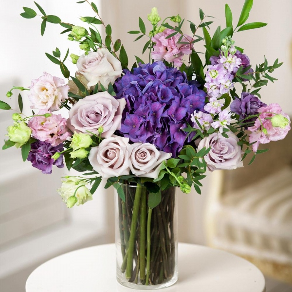 Blue/purple hydrangea - 1, Pink rose 50 cm - 5, Matthiola Lilac - 2, Lilac carnation - 3, Pink Lisianthus (Eustoma) - 3, Ruscus, Eucalyptus parvifolia (1 pc.), Wrapping Paper