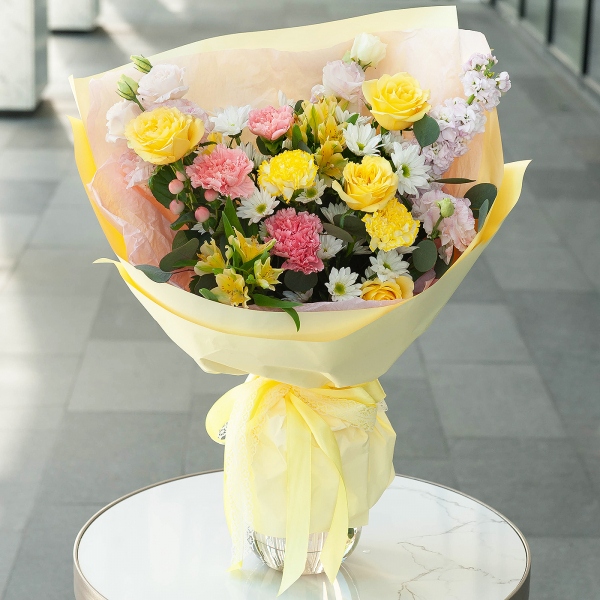 Pink carnation - 3, Yellow carnation - 2, Alstromeria Yellow, Orange - 2, Rose Yellow 50 cm Ecuador (Mohana, Latina, Brighton) - 5, Pink Lisianthus (Eustoma) - 3, Bacardi White Spray Chrysanthemum - 3, Pink Matthiola - 1, Hypericum, Wrapping Paper, Eucalyptus baby blue (1 pc.)