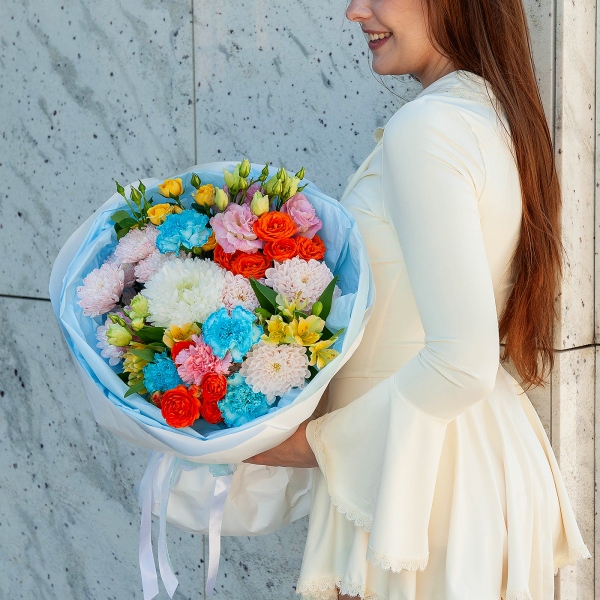 Baltica Pink Spray Chrysanthemum - 2, Magnum White Chrysanthemum - 1, Pink carnation - 3, Carnation white, cream - 7, Pink Lisianthus (Eustoma) - 2, Alstromeria Yellow, Orange - 7, Spray rose: yellow, orange 50 cm - 3, Wrapping Paper