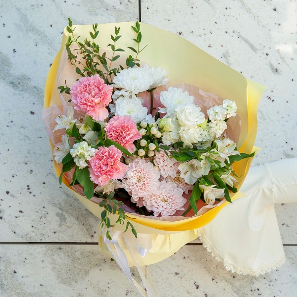 Pink carnation - 7, White Matthiola - 2, Baltica White Spray Chrysanthemum - 2, Alstromeria white, soft pink - 5, lisianthus - 1, Hypericum, Eucalyptus parvifolia (1 pc.), Wrapping Paper