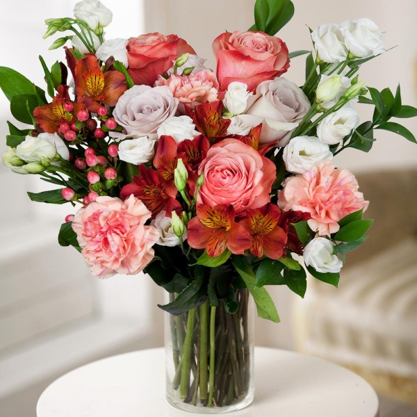 Peony rose Kahala 50 cm - 4, Pink rose 50 cm - 3, Pink carnation - 4, Alstromeria Red, Bright Pink - 3, lisianthus - 3, Ruscus, Hypericum, Wrapping Paper