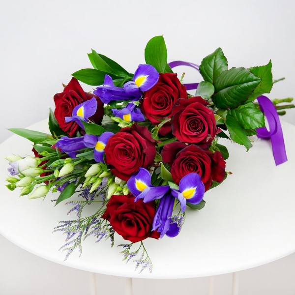 Purple Lisianthus (Eustoma) - 3, Red rose 50 cm - 10, Irises - 4, Limonium (1 pc.), Ruscus, Ribbon