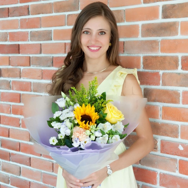 Sunflower - 1, Yellow rose 50 cm - 1, Carnation white, cream - 1, Santini White Spray Chrysanthemum - 1, Alstromeria white, soft pink - 1, lisianthus - 2, Solidago (1 pc.), Ruscus, Ribbon, Wrapping Paper
