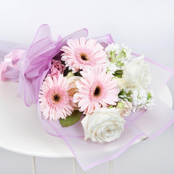 Gerbera pink - 3, White rose 50 cm - 3, lisianthus - 2, White Matthiola - 2, Wrapping Paper