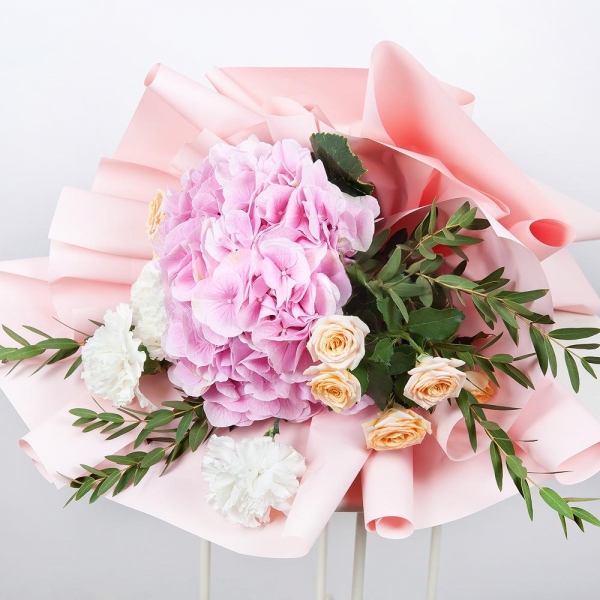Pink Hydrangea - 1, Carnation white, cream - 5, Spray rose: white, cream, light pink 50 cm - 3, Eucalyptus parvifolia (1 pc.), Wrapping Paper