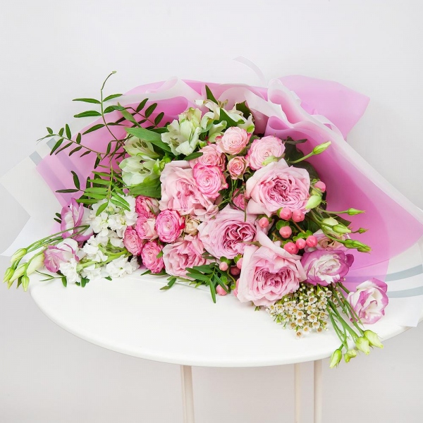 Peony rose pink 'OHara' - 8, Pink Lisianthus (Eustoma) - 4, Spray rose: white, cream, light pink 50 cm - 4, Alstromeria white, soft pink - 3, White Matthiola - 3, Hypericum, Waxflower (1 pc.), Wrapping Paper, Pistachio