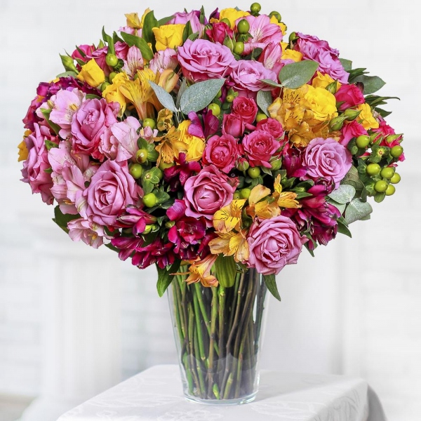 Pink rose 50 cm - 25, Bright pink spray rose mix, 50 cm - 8, Alstromeria Red, Bright Pink - 6, Alstromeria Yellow, Orange - 6, Alstromeria lilac, purple - 5, Spray rose: yellow, orange 50 cm - 9, Hypericum, Eucalyptus Cinerea, Ribbon