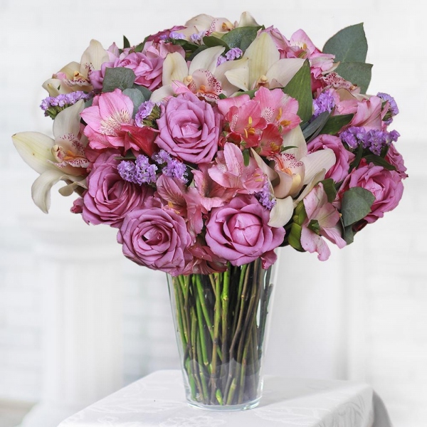 Rose Purple 50 cm Ecuador (Deep Water, Deep Purple, Moody Blue) - 19, White Cymbidium Orchid Bud - 11, Alstromeria white, soft pink - 11, Blue Statice, Flask for orchids, Eucalyptus populus (1 pc.), Wrapping Paper