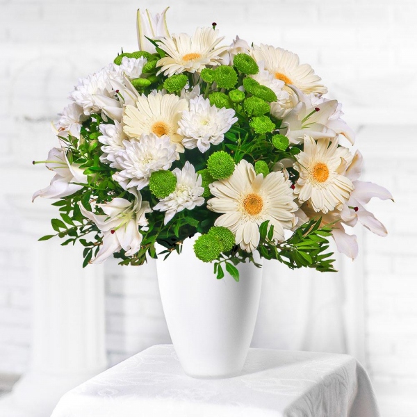 Lilies - 5, Athos pom Feeling Green - 3, Baltica White Spray Chrysanthemum - 6, Gerbera white - 8, Pistachio, Mesh (Abaka), Ribbon