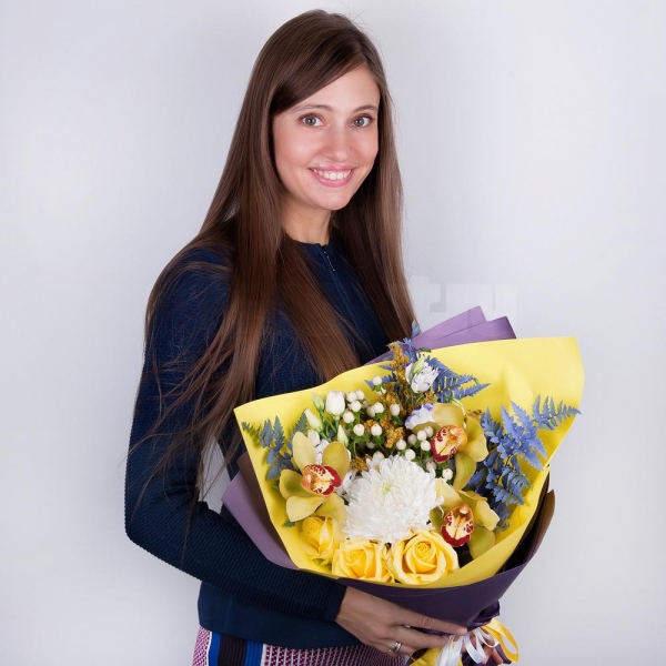 Magnum White Chrysanthemum - 1, Orchid bud yellow/brown Cymbidium - 3, Purple Lisianthus (Eustoma) - 2, Yellow rose 50 cm - 3, Flask for orchids, Hypericum, Solidago (1 pc.), Fern (1 pc.), Wrapping Paper