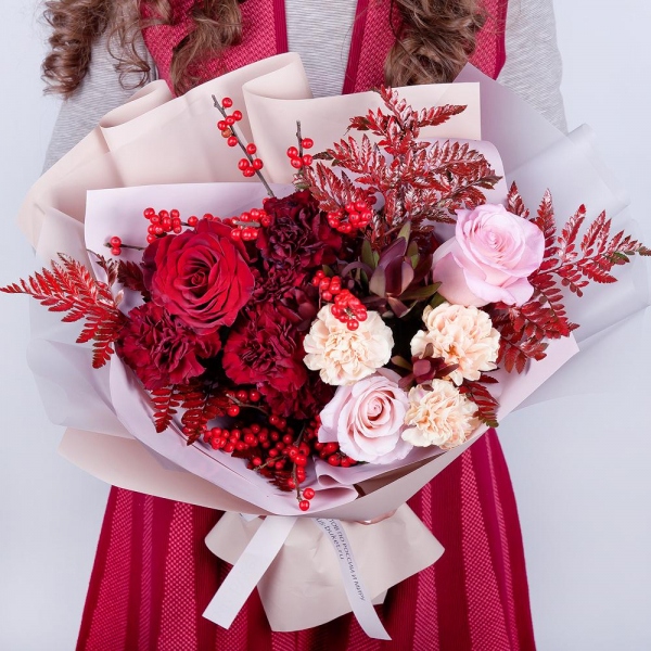 Red rose 50 cm - 2, Pink rose 50 cm - 2, Carnation red - 6, Carnation white, cream - 4, Fern (1 pc.), Ilex, Leukodendron, Wrapping Paper, Ribbon