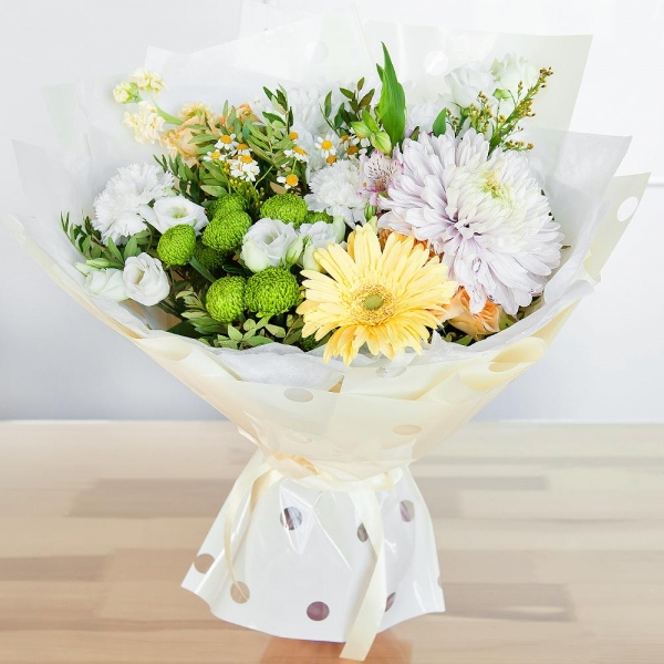 Chamomile - 1, Baltica White Spray Chrysanthemum - 2, Athos pom Feeling Green - 1, Alstromeria white, soft pink - 2, lisianthus - 2, Spray rose: white, cream, light pink 50 cm - 2, White Matthiola - 2, Carnation white, cream - 3, Magnum Purple Chrysanthemum - 1, Gerbera yellow - 1, Solidago (1 pc.), Pistachio, Wrapping Paper