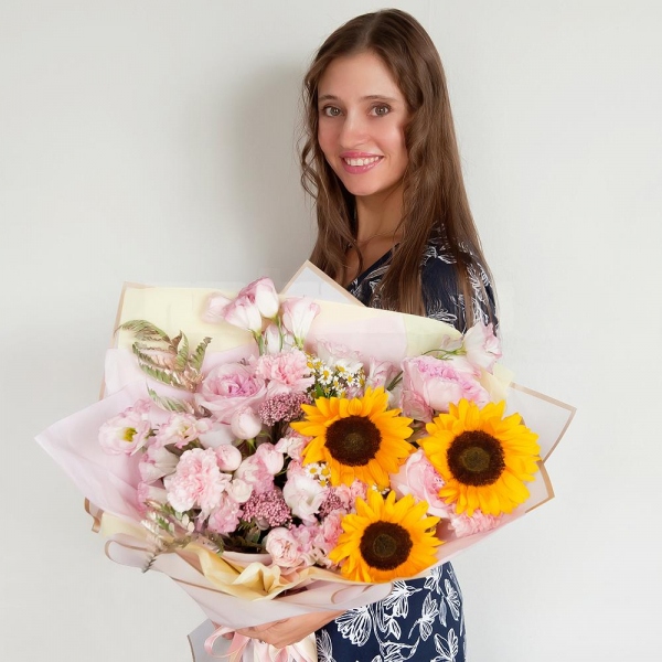 Sunflower - 3, Pink carnation - 9, Pink Lisianthus (Eustoma) - 3, Pink rose 50 cm - 7, Chamomile - 3, Peony sprayrose - 3, Ozotamnus, Fern (1 pc.), Wrapping Paper