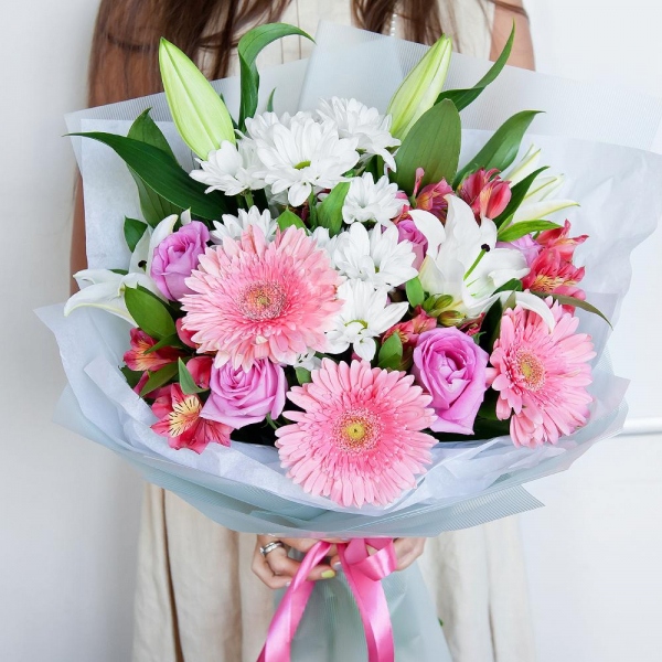 Lilies - 2, Alstromeria Red, Bright Pink - 4, Gerbera pink - 4, Pink rose 50 cm - 9, Bacardi White Spray Chrysanthemum - 4, Pistachio, Ruscus, Wrapping Paper, Ribbon