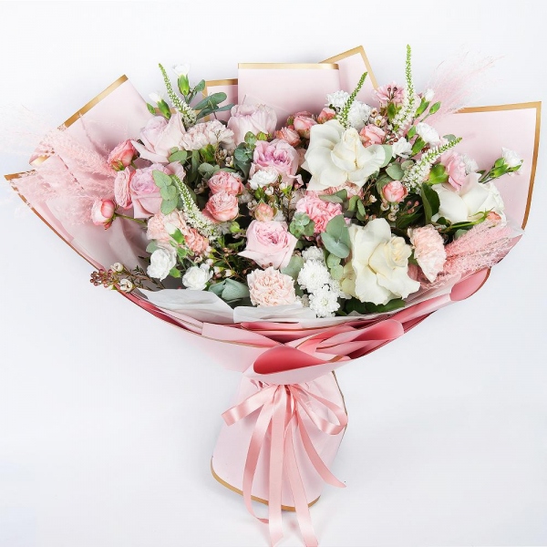 Peony rose pink 'OHara' - 5, Bright pink spray rose mix, 50 cm - 5, Carnation white, cream - 4, White spray carnation - 6, Baltica White Spray Chrysanthemum - 4, White rose 50 cm Ecuador - 5, Pink carnation - 5, Eucalyptus Cinerea, Veronica spray, Waxflower (1 pc.), Wrapping Paper, Dried flowers in assortment