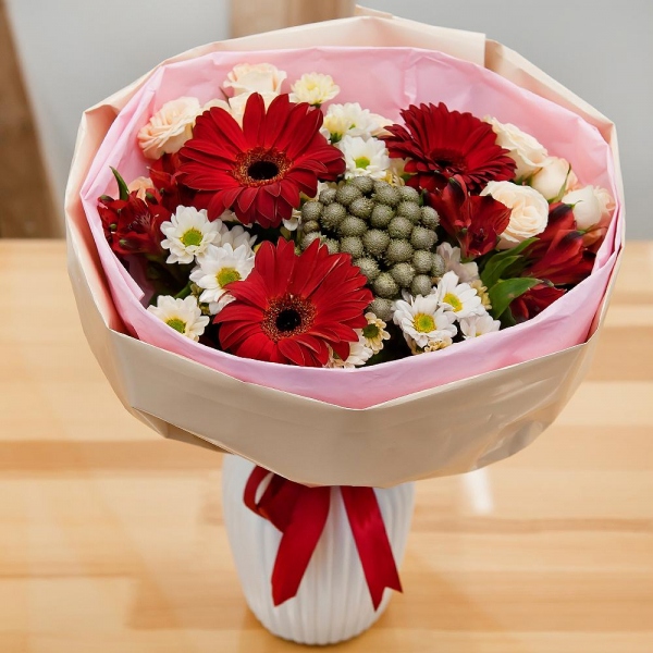 Gerbera red - 3, Santini White Spray Chrysanthemum - 3, Spray rose: white, cream, light pink 50 cm - 2, Alstromeria Red, Bright Pink - 2, Brunia Green Lanuginosa (1 pc.), Wrapping Paper, Ribbon