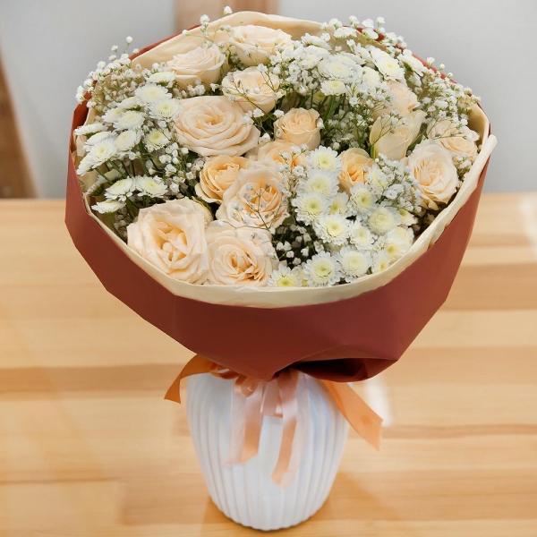 Spray rose: white, cream, light pink 50 cm - 4, Athos poms Stallion - 3, Gypsophila - 2, Wrapping Paper