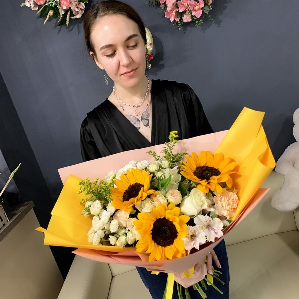 Sunflower - 3, Carnation white, cream - 5, Santini White Spray Chrysanthemum - 4, Alstromeria white, soft pink - 4, Peony sprayrose - 4, White rose 50 cm - 4, Solidago (1 pc.), Wrapping Paper, Ribbon