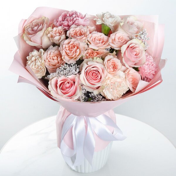 Bright pink spray rose mix, 50 cm - 3, Pink rose 50 cm - 5, Carnation white, cream - 3, Pink carnation - 4, Solidago (1 pc.), Wrapping Paper