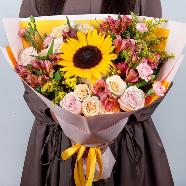 Sunflower - 1, Spray rose: white, cream, light pink 50 cm - 3, Pink rose 50 cm - 5, Pink spray carnation - 6, Alstromeria Red, Bright Pink - 6, Baltica White Spray Chrysanthemum - 1, Solidago (1 pc.), Wrapping Paper