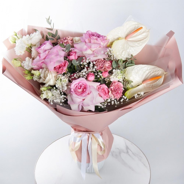 White cut anthurium - 2, Rose Pink 50 cm Ecuador (Chelo, Hermosa, Novia, Titanik, Engagement, Pink Mondiale) - 3, White Matthiola - 2, Bright pink spray rose mix, 50 cm - 2, lisianthus - 1, Pink carnation - 3, Gypsophila - 1, Eucalyptus, Wrapping Paper