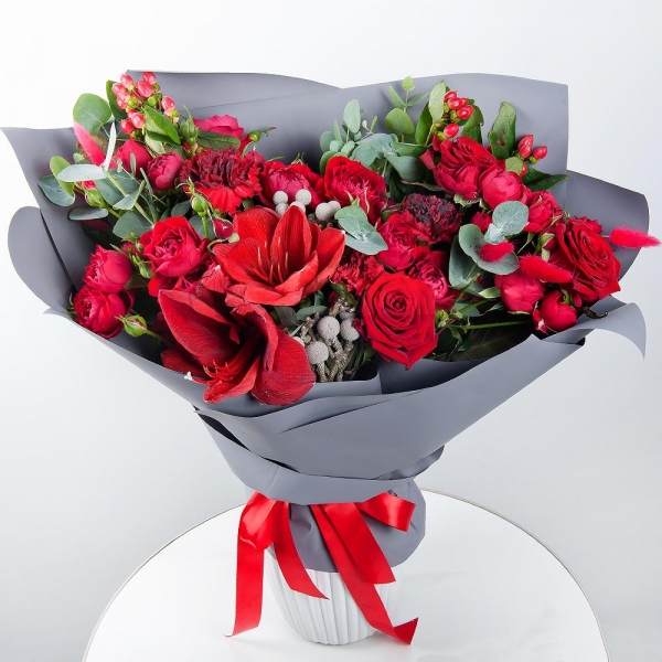 Red amaryllis - 1, Carnation red - 5, Red rose 50 cm - 4, Spray peony rose Misty Bubbles, 50 cm - 5, Dried flowers in assortment, Eucalyptus, Hypericum, Brunia Green Lanuginosa (1 pc.), Wrapping Paper