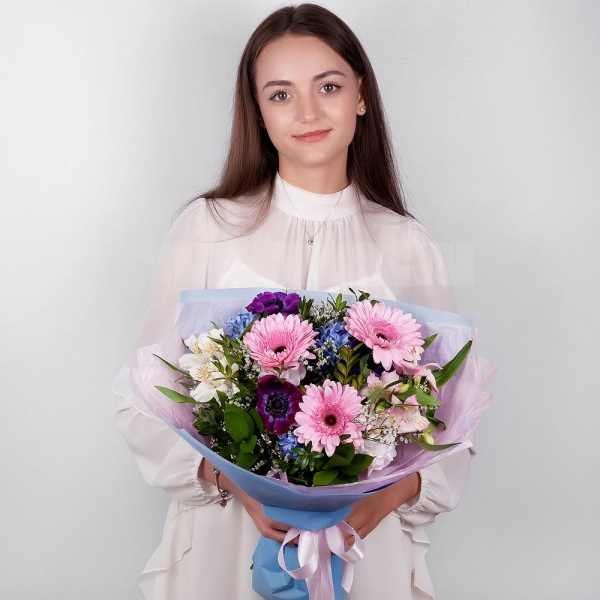 Gerbera pink - 3, Blue anemone - 4, Blue Hyacinth - 4, Alstromeria white, soft pink - 4, Freesia - 2, Limonium (1 pc.), Pistachio, Ruscus, Wrapping Paper