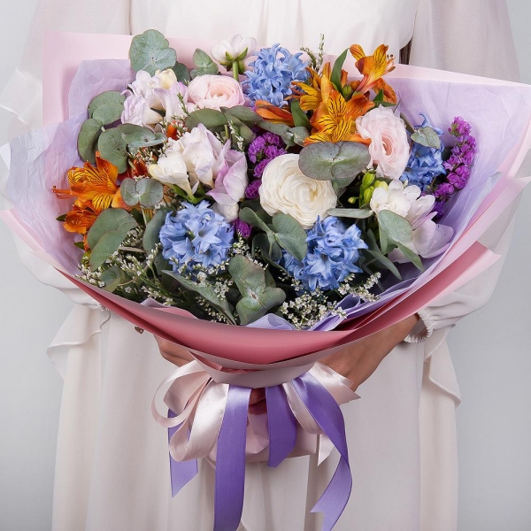 Blue Hyacinth - 5, Freesia - 3, Ranunculus Pink - 3, Alstromeria Yellow, Orange - 4, Limonium (1 pc.), Blue Statice, Eucalyptus, Wrapping Paper