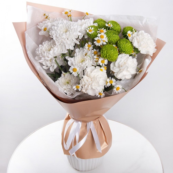 Baltica White Spray Chrysanthemum - 2, Carnation white, cream - 5, Chamomile - 2, Athos pom Feeling Green - 2, Wrapping Paper
