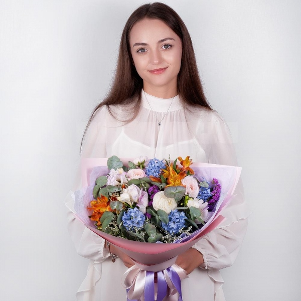 Blue Hyacinth - 5, Freesia - 5, Ranunculus Pink - 3, Alstromeria Yellow, Orange - 6, Limonium (1 pc.), Blue Statice, Eucalyptus, Wrapping Paper